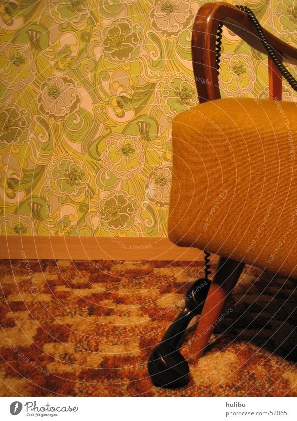 Nobody here? Seventies Sixties Vintage car Retro Armchair Telephone Wall (building) Wallpaper Carpet Brown Green Pattern Floral wallpaper Telephone cable