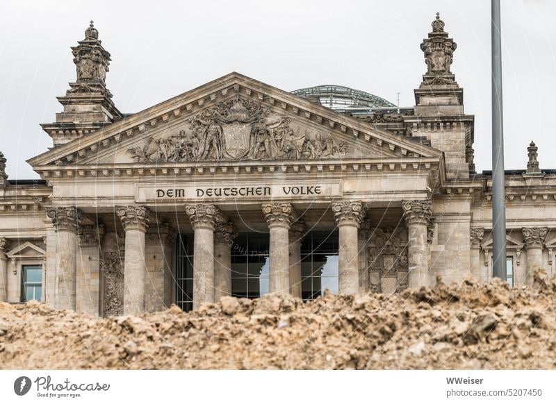The Reichstag or the German Bundestag in Berlin is sinking into a sand pit Government Parliament Government building Germany Republic Capital city