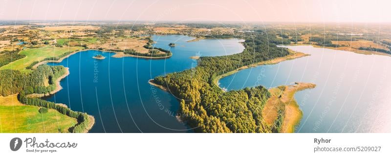 Braslaw District, Vitebsk Voblast, Belarus. Aerial View Of Nedrovo Lake, Green Forest Landscape. Top View Of Beautiful European Nature From High Attitude. Bird's Eye View. Famous Lakes. Panorama