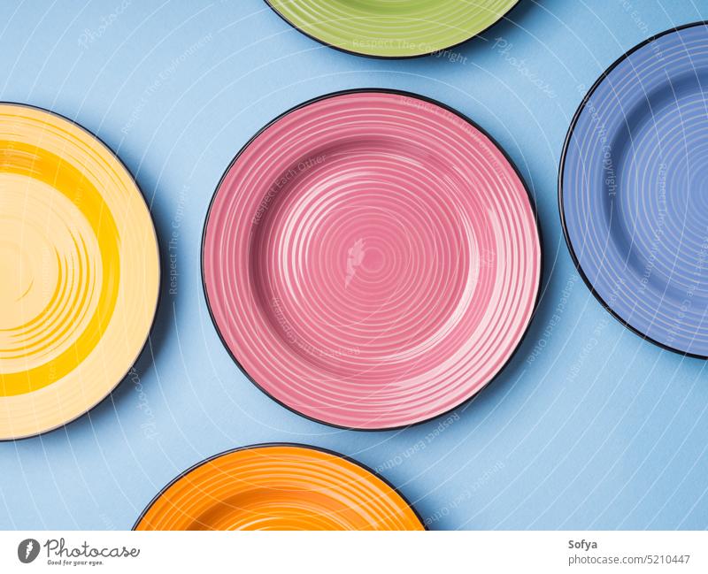 Colorful ceramic dishes. Flat lay plate tableware set colorful background empty clean crockery pastel flat overhead flatly food eat serve texture abstract