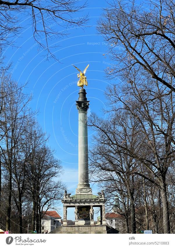 Peace sign in and above the city: the peace angel in Munich under a blue sky. Angel of peace Sign Symbols and metaphors Hope Freedom Politics and state