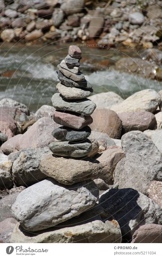 cairn stones stone stack Pile of stones balance Nature River Balance sorted small and big