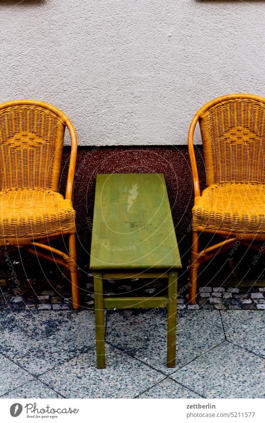 Two chairs and a table city Worm's-eye view downtown Kiez Life Town city district street photography City trip Scene scenery Tourism daily life urban