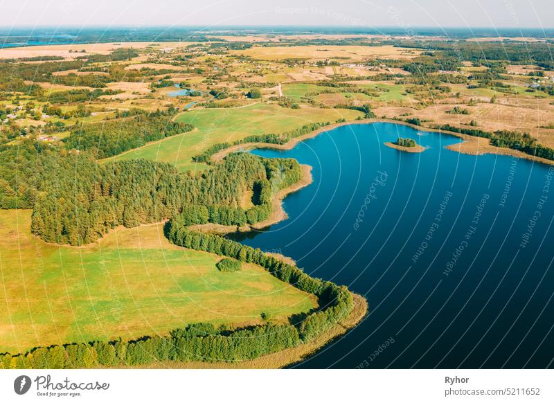 Braslaw District, Vitebsk Voblast, Belarus. Aerial View Of Nedrovo Lake, Green Forest Landscape. Top View Of Beautiful European Nature From High Attitude. Bird's Eye View. Famous Lakes