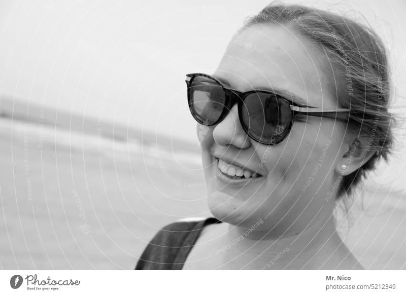 young woman , smiling on beach naturally Contentment Joie de vivre (Vitality) potrait Face Feminine Happiness Joy rays Laughter Sunglasses portrait Positive