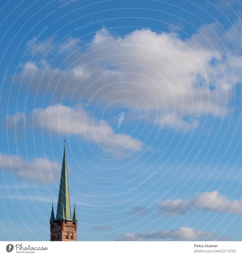 Over the church top into the sky Church spire Tower Clouds Sky Religion and faith Manmade structures Building Architecture Copy Space top Exterior shot Belief