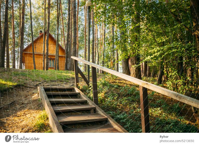 Tourist Guest House For Rest. Wooden House In Forest In Autumn Sunny Day Lode Novoe Lyadno Pension Lode Vitebsk Region belarus europe travel tourism landscape