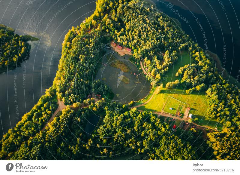 Novoe Lyadno, Lepel Lake, Beloozerny District, Vitebsk Region. Aerial View Of Island Pension Lode In Autumn Morning. Morning Fog Above Lepel Lake. Top View Of European Nature From High Attitude In Autumn. Bird's Eye View. Flat View. Close Up