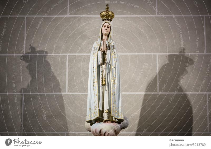 Statue of Our Lady Christmas God ancient birth black blessed catholic christ christian christianity church concept double evil faith figure good heaven hell