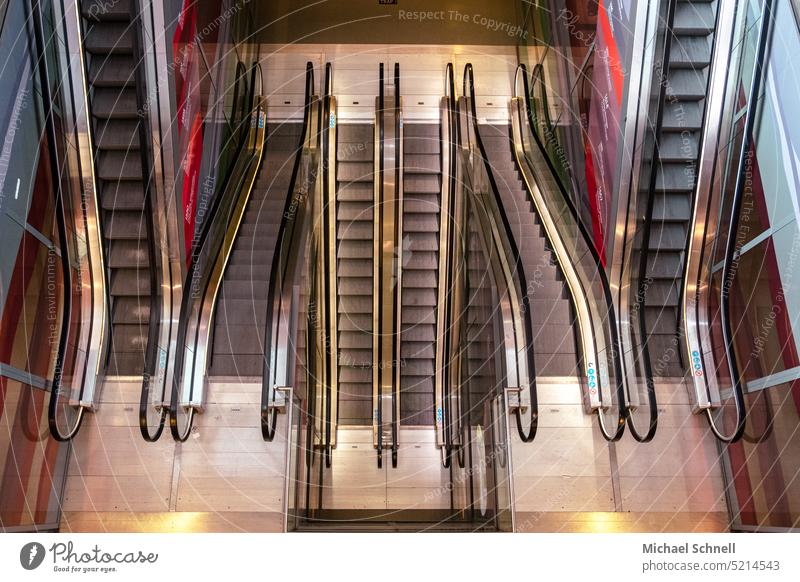 Escalator variety Escalators Tall down up and down Promotion Help Upward Downward Stairs Architecture rail Above Go up Deserted Descent ascent Technology