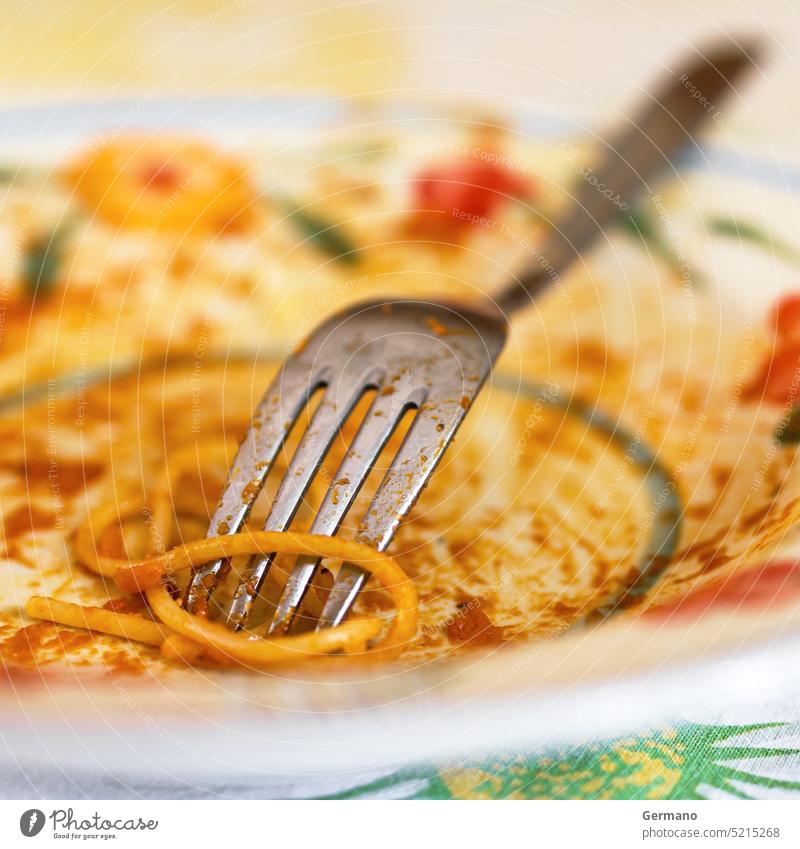 Dish after eating plate fork food white dirty meal spaghetti finished empty over concept dinner used dish cooking background table pasta sauce red crumbs tomato