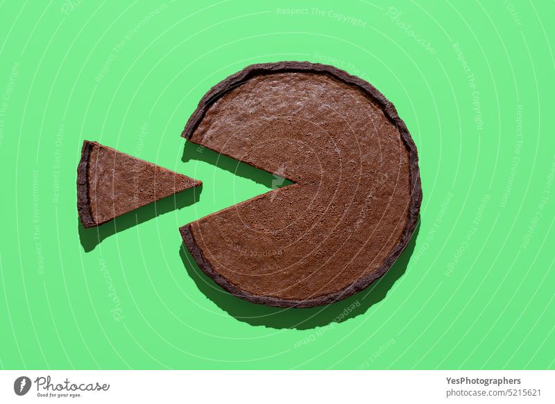 Homemade chocolate cake above view, minimalist on a green background baked black bright brown calories chart christmas circle close-up cocoa color confectionery