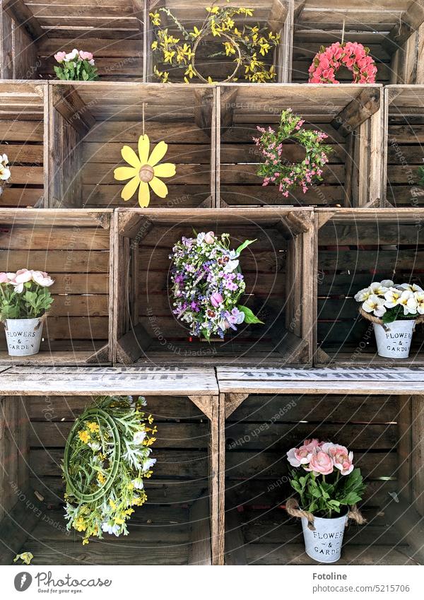 Spring decoration in wooden boxes. Unfortunately, all the plants are artificial. Wood boards flowers Artificial Plastic plastic phoney Decoration ornamental