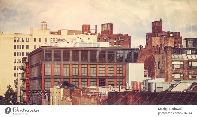 New York cityscape at sunset, color toning applied, USA. Manhattan building office NYC filtered travel architecture urban vintage retro effect facade old modern