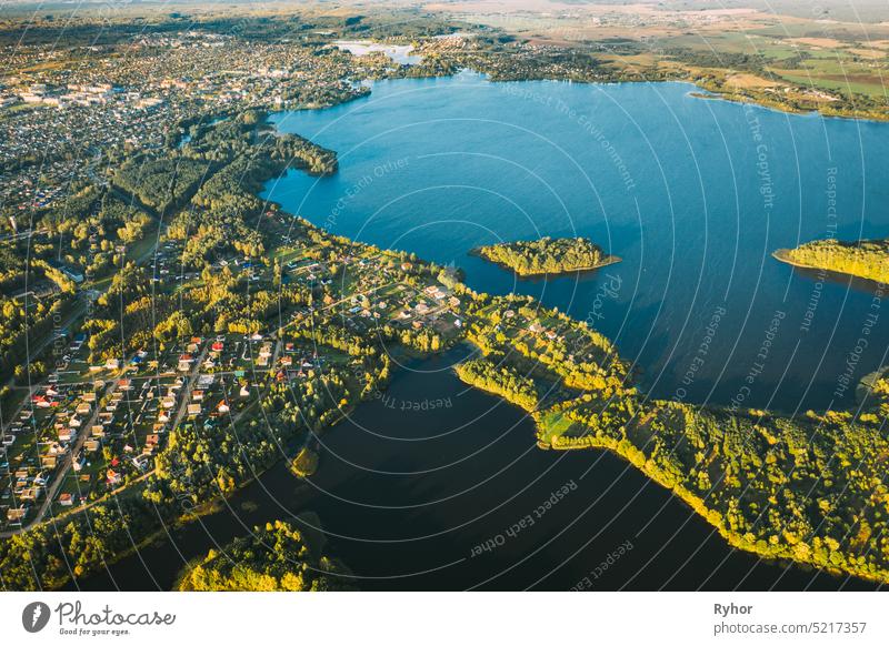 Lyepyel, Lepel Lake, Beloozerny District, Vitebsk Region. Aerial View Of Lyepyel Cityscape Skyline In Autumn Morning. Morning Fog Above Lepel Lake. Top View Of European Nature From High Attitude In Autumn. Bird's Eye View