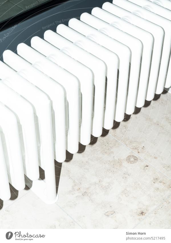 Radiator in cold light Heater Abstract White Bright Heating Cold Temperature Save Save energy heating costs Flat (apartment) Row Repeating Surface Minimalistic
