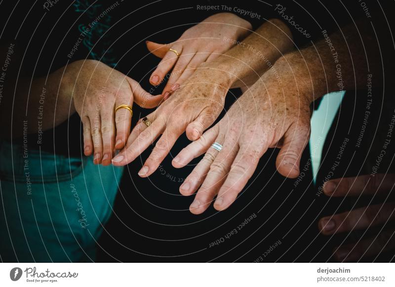 Show me your hands. Four with rings on their fingers. Hand Fingers body part Skin Shadow Arm wrist Human being Neutral Background Rings Body Exterior shot