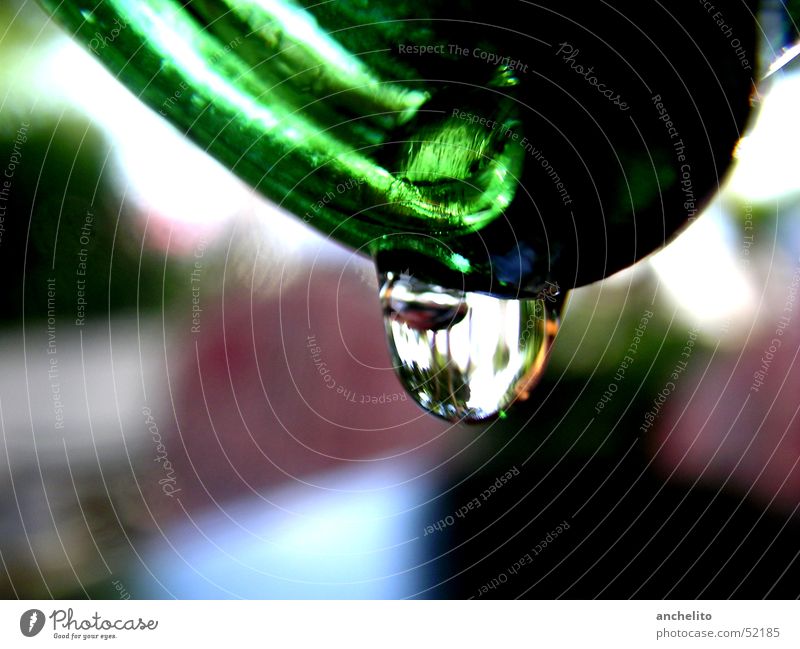 a drop from a bottle Green Liquid Background picture Hang Slope Macro (Extreme close-up) Close-up Bottle vessel Drops of water droplet Fluid reflection Glass