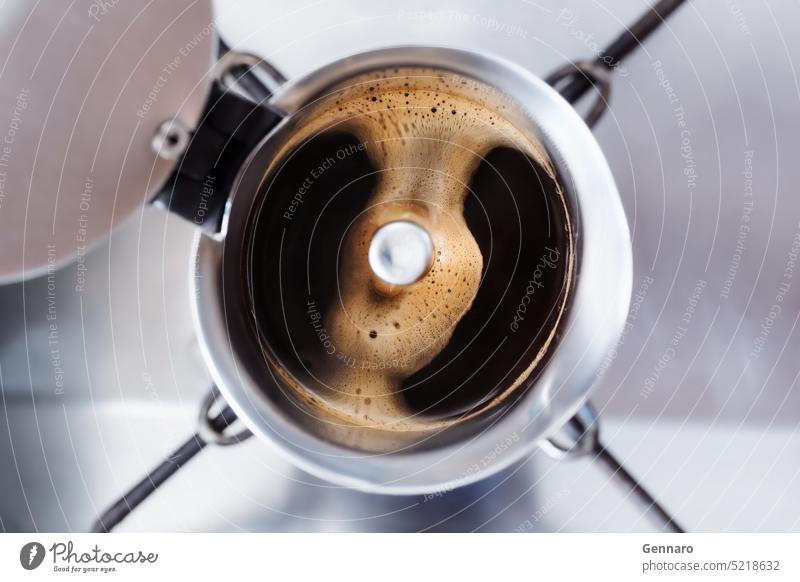 Mocha coffee espresso mocha coffee maker frothy strong caffeine break cooker preparation arabica aroma liquid top view homemade