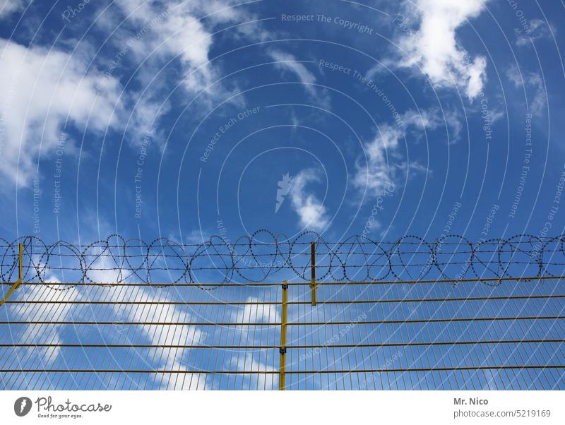 the sky knows no boundaries Clouds Sky Beautiful weather Barbed wire Fence Border Blue Barrier Wire fence Freedom Captured Border checkpoint Worm's-eye view