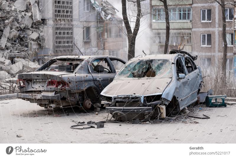 damaged and looted cars in a city in Ukraine during the war Donetsk Kherson Lugansk Mariupol Russia Zaporozhye abandon abandoned attack blown up bombardment