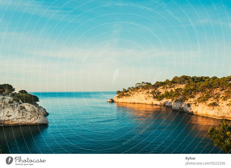 Calanques, Cote de Azur, France. Beautiful nature of Calanques on the azure coast of France. Calanques - a deep bay surrounded by high cliffs. Landscape in sunrise light during Sunny summer morning