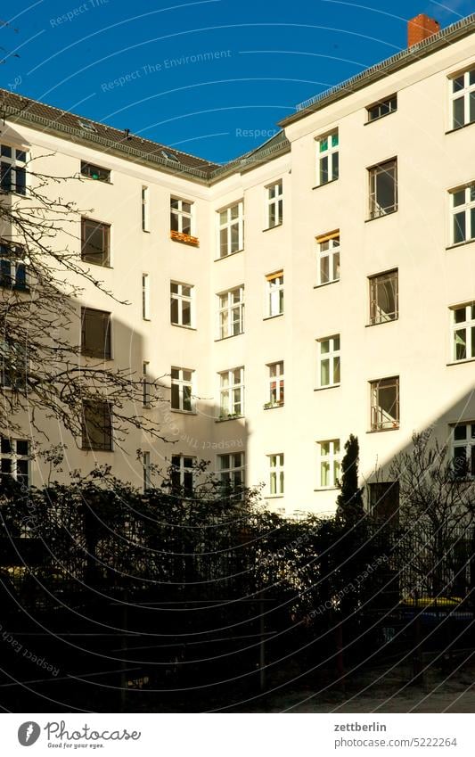 Backyard in Kreuzberg Old building on the outside Fire wall Facade Window House (Residential Structure) Sky Sky blue rear building Courtyard Interior courtyard