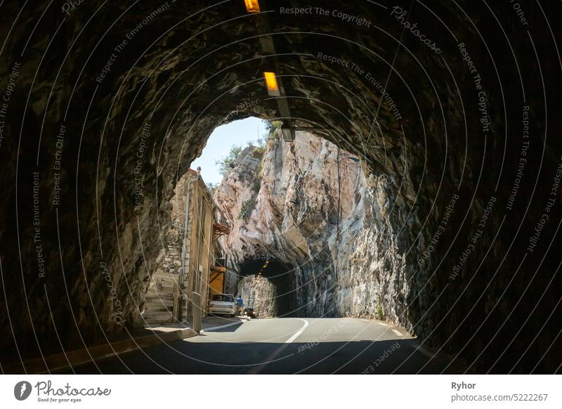 Road tunnel through rock. Monte Carlo car drive europe france freeway highway monaco motorway outdoor road scene summer tourism town transport transportation