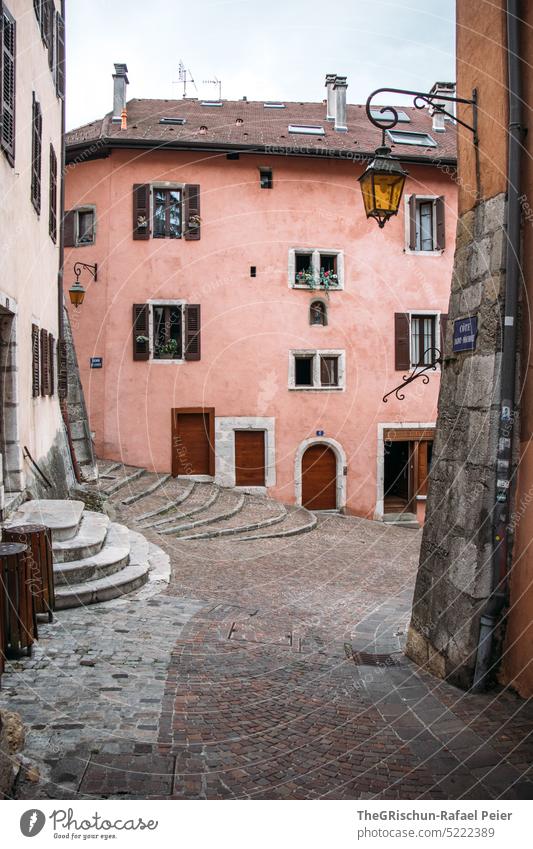 Pink house with lantern in foreground Paving stone House (Residential Structure) Stairs ancient historic old town Annecy Building Old town Architecture Historic