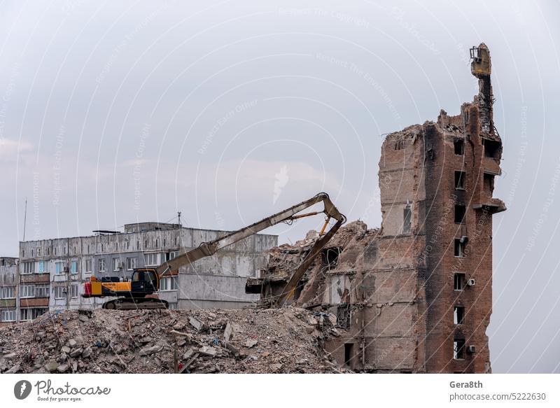 construction equipment destroys affected houses war in Ukraine Donetsk Kherson Kyiv Lugansk Mariupol Russia Zaporozhye abandon abandoned attack blown up