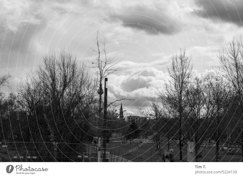wall park Television tower b/w Sky Prenzlauer Berg Downtown Town Berlin Capital city Black & white photo Exterior shot Deserted Day Park Clouds