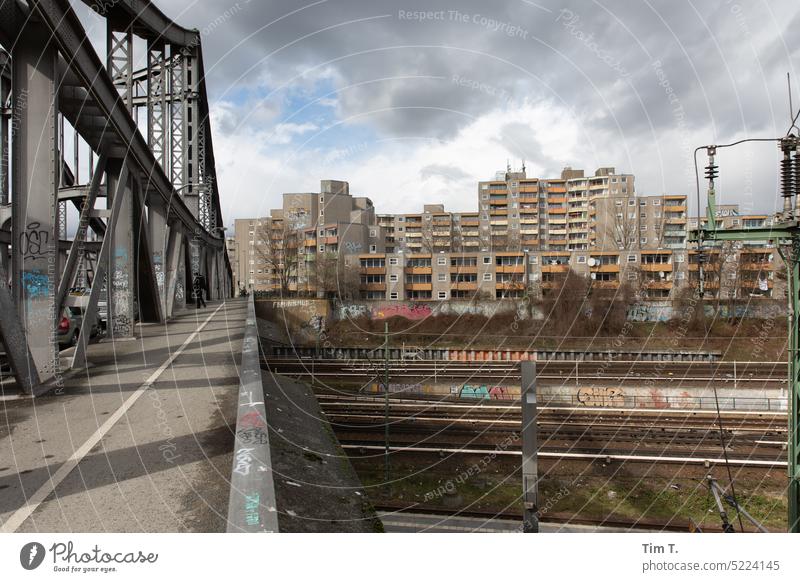 Bridge over the railroad tracks in Berlin Wedding well of health Prefab construction Colour photo Railroad tracks Clouds Spring Architecture Sky Exterior shot