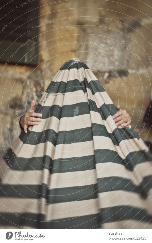 magic hood Hand 1 Human being To hold on Joy Timidity Sunshade Cloth Striped Hide Masonry Colour photo Subdued colour Exterior shot Day Blur