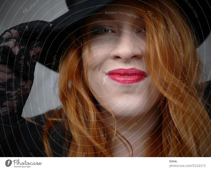 woman with hat Woman Feminine Smiling Hat Red-haired Lipstick Wearing makeup Gloves Curl pretty kind cheerful Hand Shadow