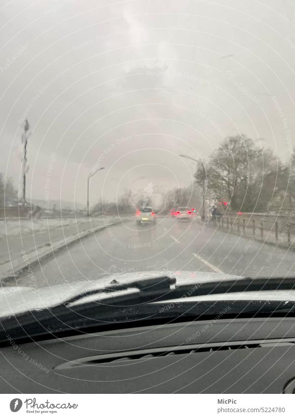 Rainy weather road traffic poor visibility pelting review far vision Car window Windscreen wiper cars Street Water Road traffic Bad weather Motoring Transport