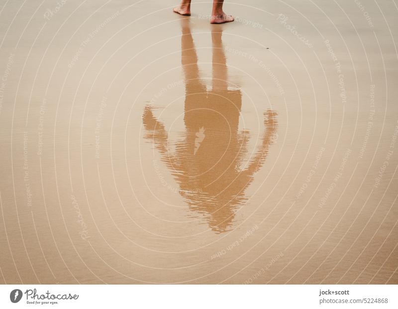 Senior on beach shows attitude Man Beach Reflection Vacation & Travel Sand Relaxation Human being Surface of water Water reflection Calm Hazy Silhouette
