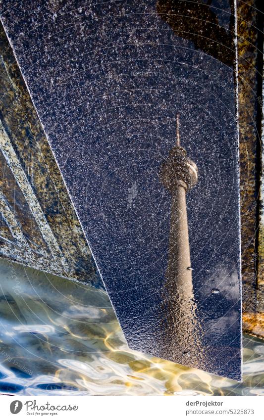 A reflection of the TV tower on wet stones Aerial photograph Deserted Copy Space middle Structures and shapes Copy Space top Pattern Abstract Contrast