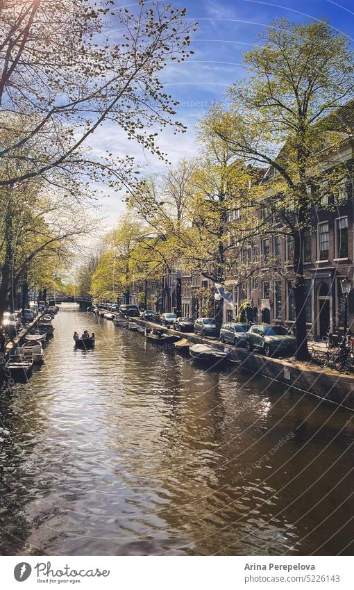 The spring Amsterdam Netherlands city canal boat view Water