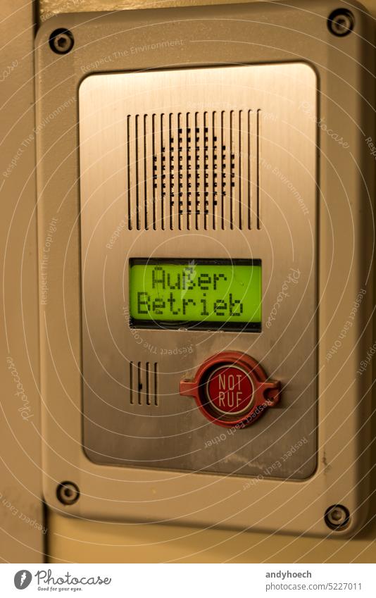 Inscription in german language out of service with an emergency call button below it 911 aid alarm ambulance assistance Background care clinic communication