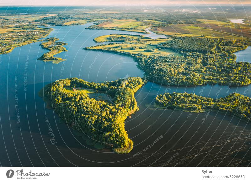Lyepyel, Lepel Lake, Beloozerny District, Vitebsk Region. Aerial View Of Island Pension Lode In Autumn Morning. Morning Fog Above Lepel Lake. Top View Of European Nature From High Attitude In Autumn. Bird's Eye View