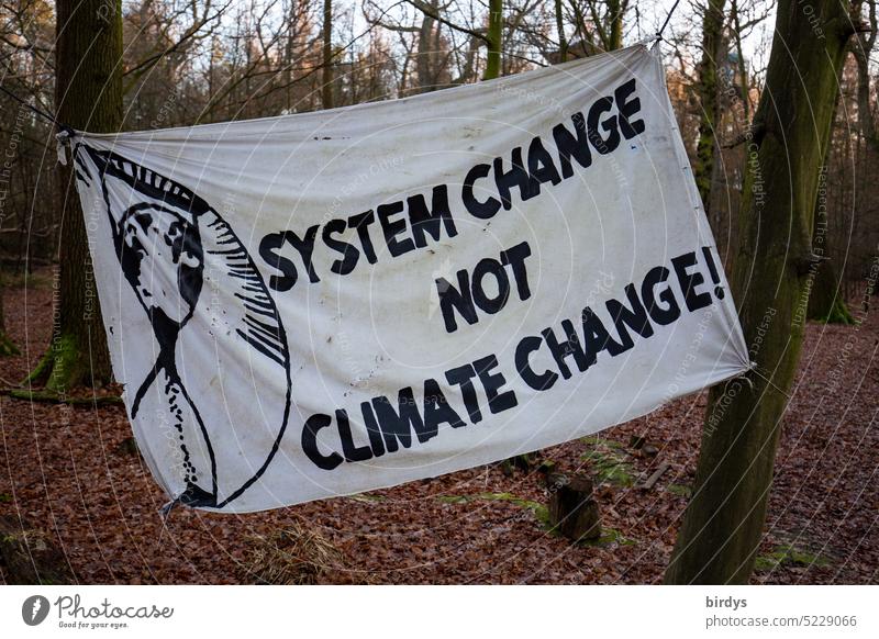 System change not climate change, banner with inscription demand Capitalism Politics and state Activism Climate change Climate protection political system