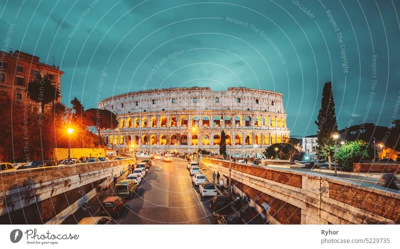 Rome, Italy. Colosseum Also Known As Flavian Amphitheatre In Evening Or Night Time Amphitheater Coliseum Roma ancient architecture arena beautiful blue building
