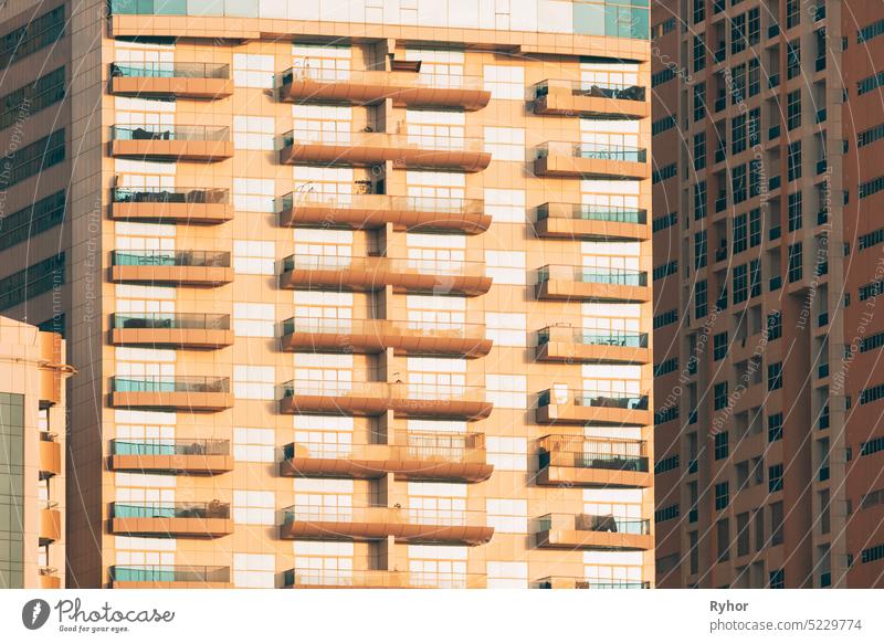 Wall With A Balcony Of New Empty Modern Multi-storey Residential Building House In Residential Area business outdoor outside town balcony day white development