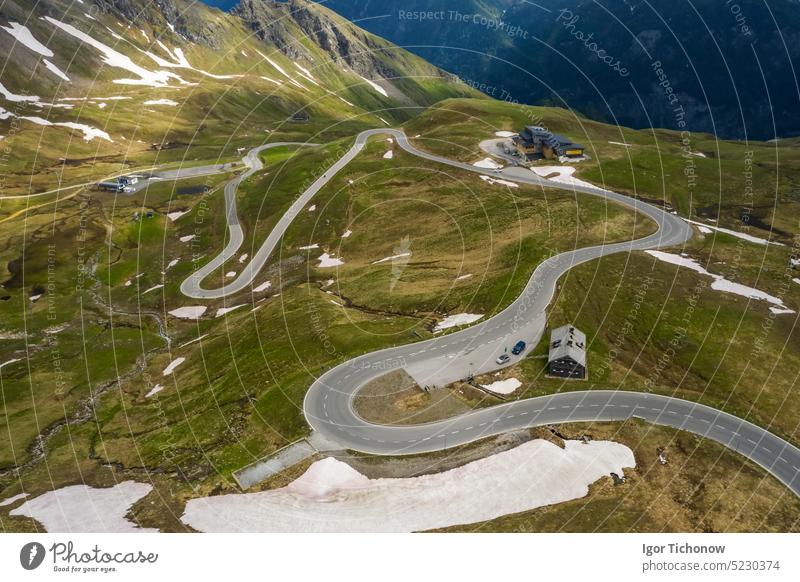 Serpentine road over mountain pass - Grossglockner, Austria grossglockner austria touring shot nature scenic view landscape travel alps cold snow day serenity