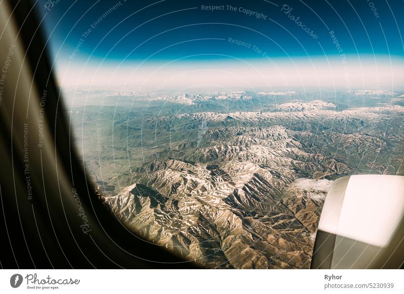 Aerial View Of Mountains Of Urmia Region From Window Of Plane. West Azerbaijan Province, Iran tourism travel Birds-eye View Western Asia aerial aerial view air