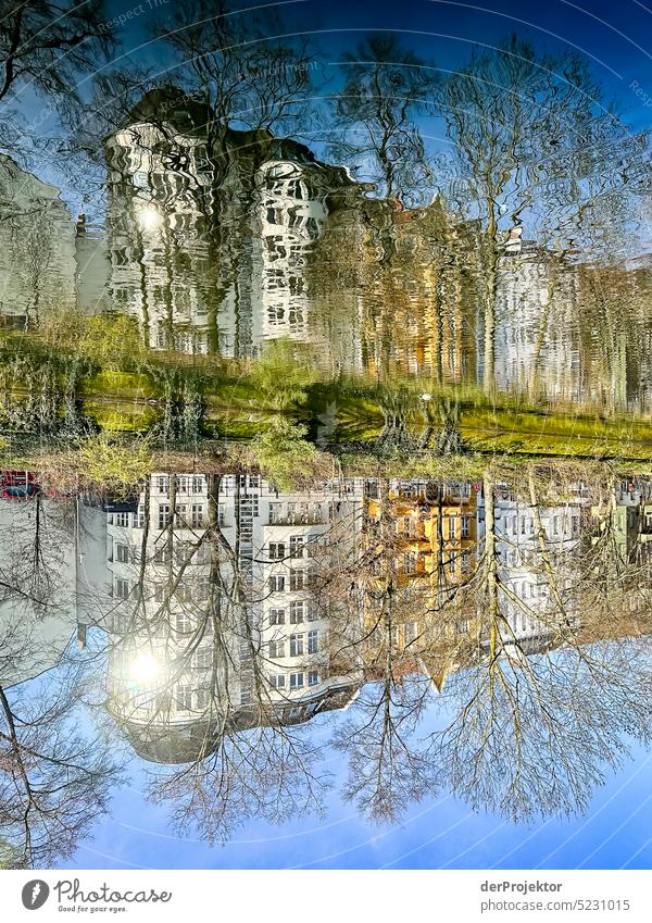 A reflection of a house in the Landwehrkanal in Kreuzberg Aerial photograph Deserted Copy Space middle Structures and shapes Copy Space top Pattern Abstract