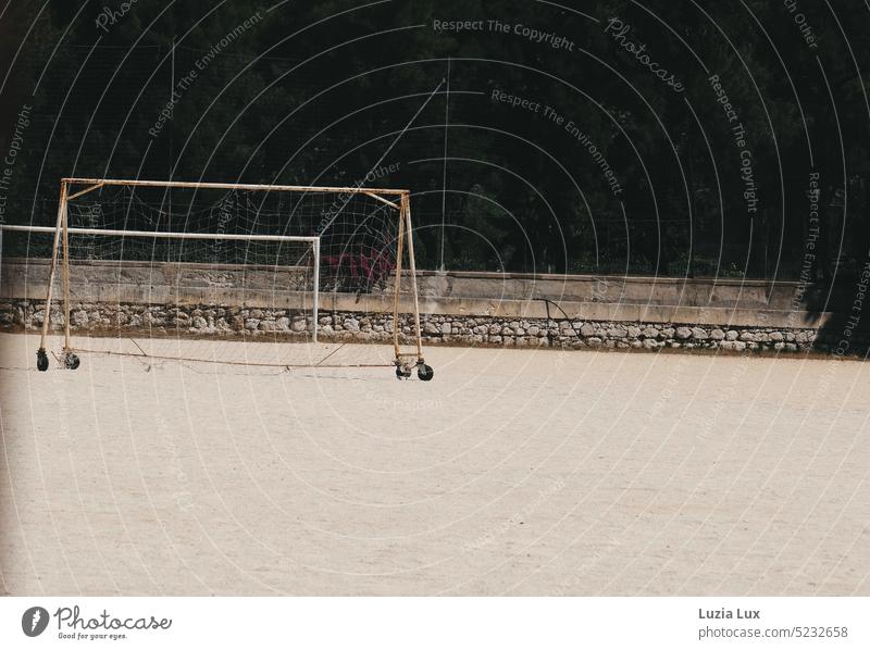 Summer heat over an old, abandoned sports field. Lonely a mobile soccer goal... ardor summer heat Sports Sporting grounds Foot ball Goal Soccer Goal