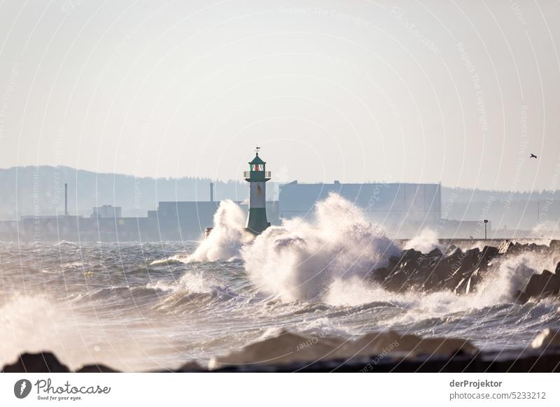 Sassnitz lighthouse in spray on the island of Rügen Winter mood Winter vacation Panorama (View) Light Day Copy Space middle Multicoloured Structures and shapes