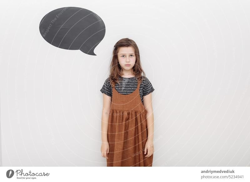little kid over white wall depressed and worry for distress, crying angry and afraid. Sad expression. mockup on wall girl child sad upset face bad isolated