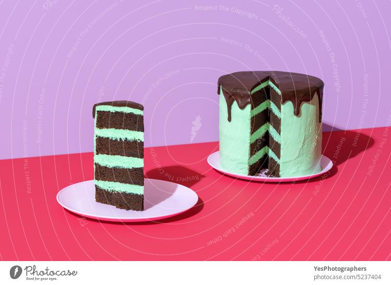 Chocolate layer cake with mint flavor buttercream, minimalist on a red table aroma background birthday black bright celebration chocolate christmas color